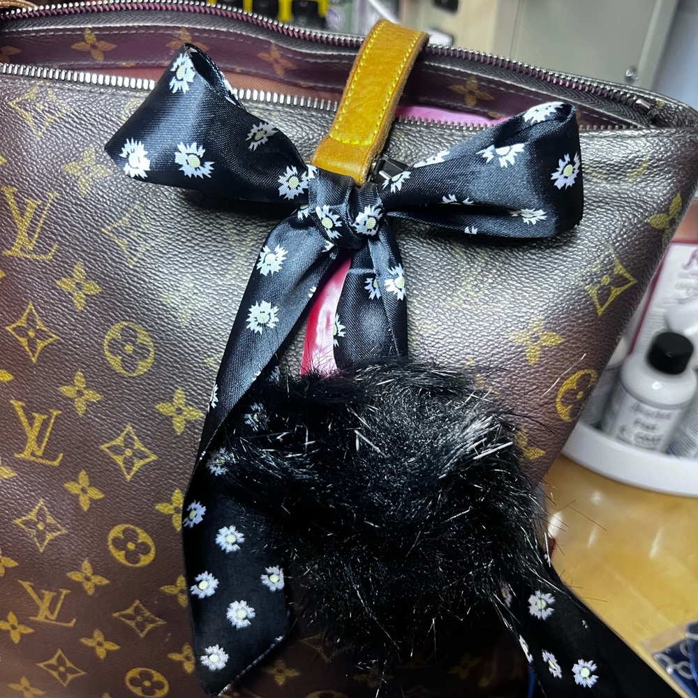 Black Floral ribbon and fluffy ball, bag accessory.